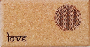 Close-up Cork Yoga Block with Yantra and "Love" inscripstion