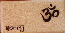 Load image into Gallery viewer, Close-up Cork Yoga Block with OM symbol and &quot;Sorry&quot; inscripstion